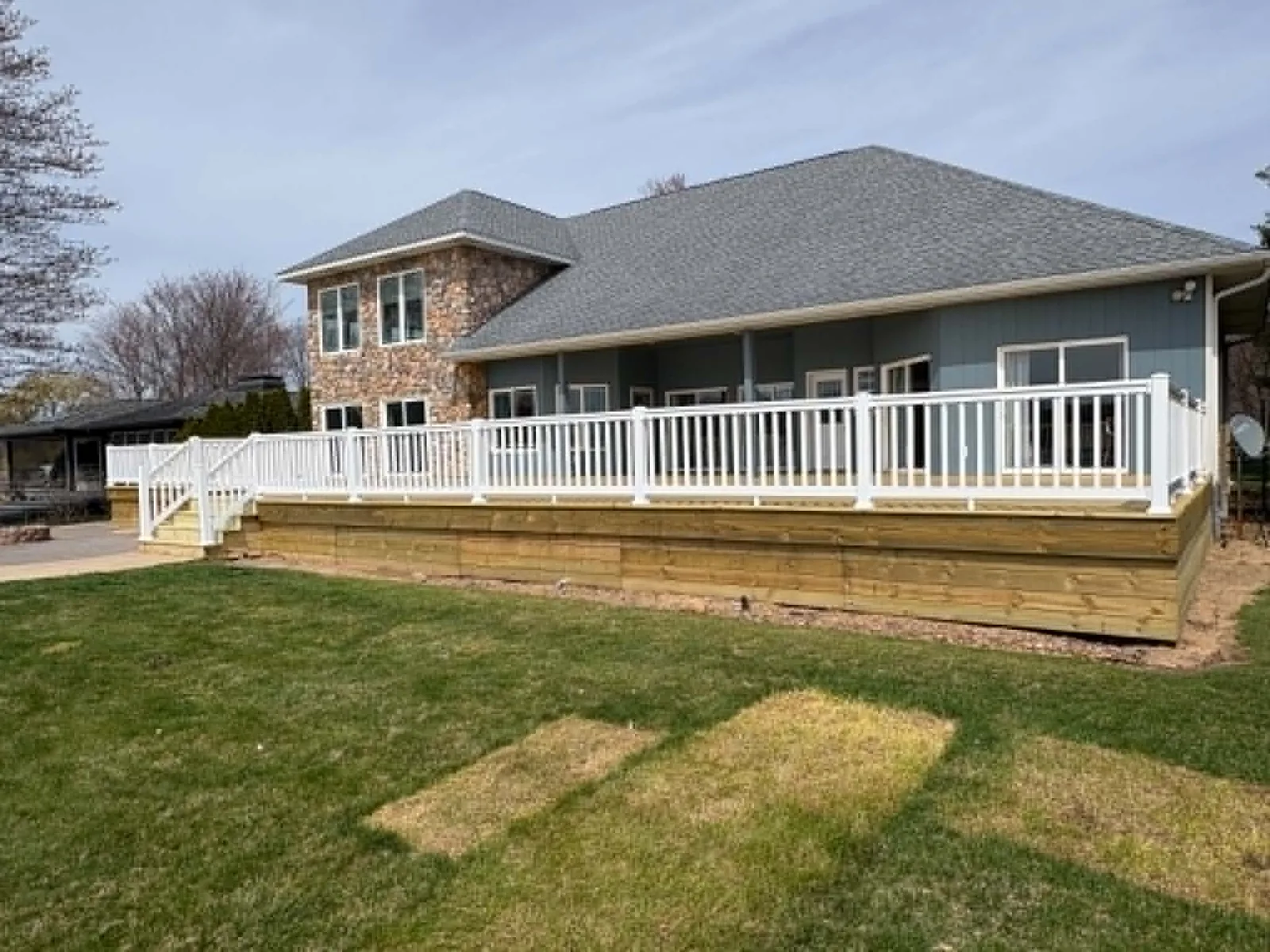 Large finished deck with white railings