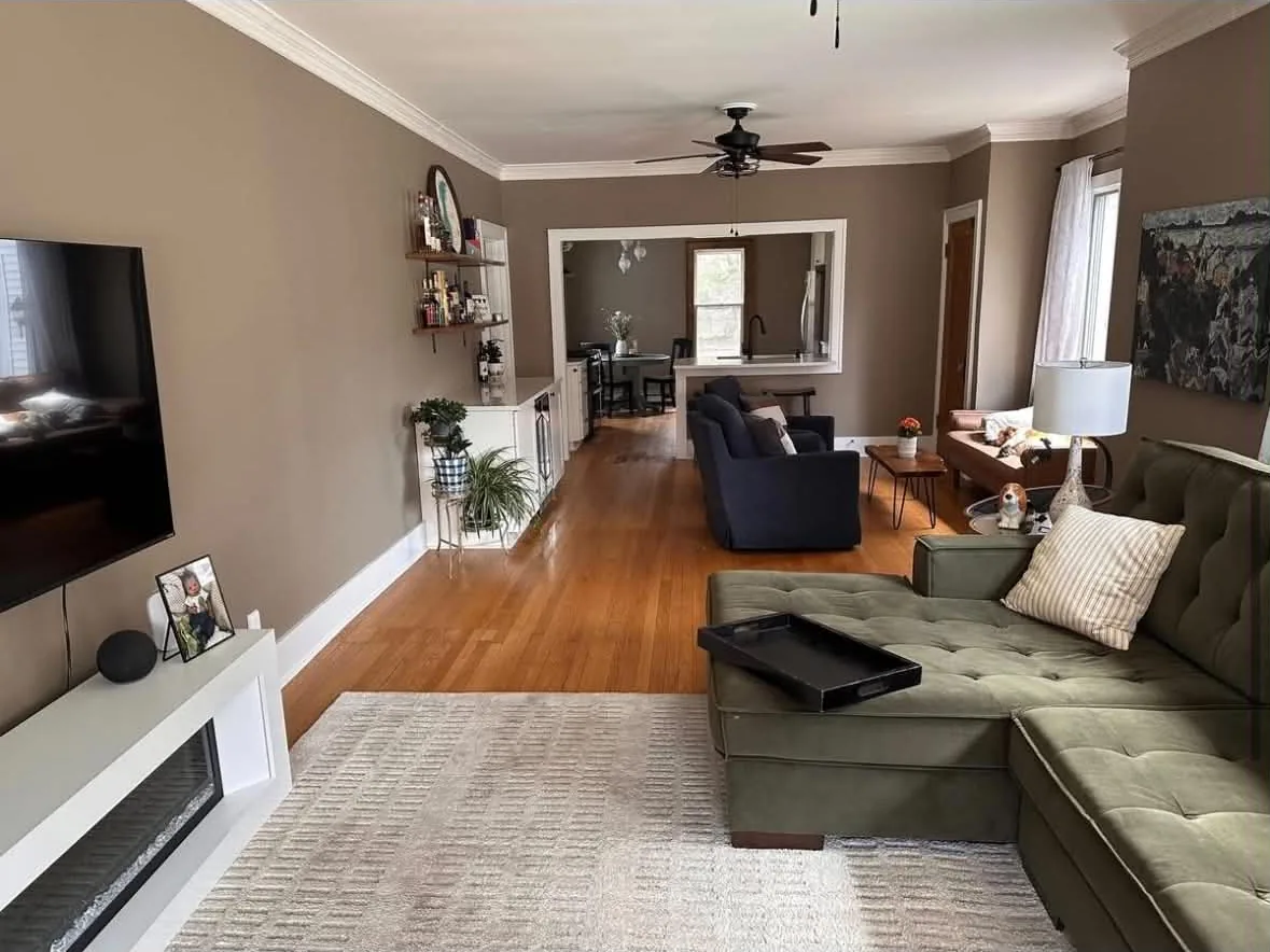 Finished living room opened into the kitchen and dining area